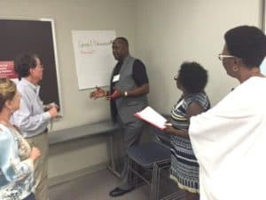 Willie Wade of Hot Springs discusses his idea for a research study during a class exercise.