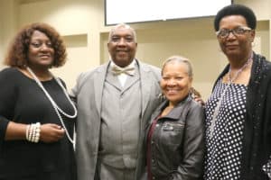 TRI Community Advisory Board members Naomi Cottoms, Charles Moore and Ann Huff with Kathryn Hall-Trujillo (center).