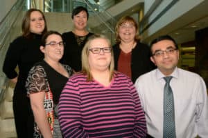 Their dedication to patient care meant putting their Christmas holiday on hold. (l-r) Suzanne Alstadt, Jennifer Holland, Dori Wong-Scoggins, Sandy Annis, Jennifer Roberts and Yogesh Jethava, M.D. 