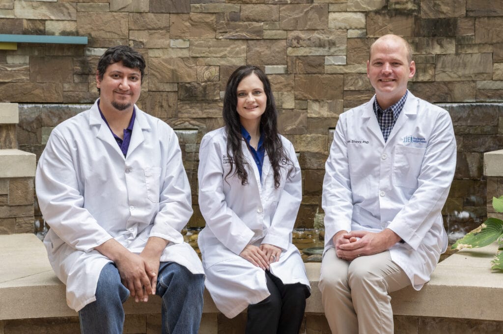 Samir Jenkins, Ph.D., Amanda Stolarz, Pharm.D., Ph.D., and Aaron Storey, Ph.D., are advancing translational research using their TRI-supported entrepreneurship training and NIH small business funding.