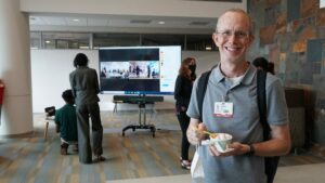 Reid Landes, Ph.D., enjoys the Loblolly ice cream offered at the event.