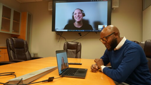 Maryam Garza, Ph.D., and Tremaine Williams, Ed.D., share a laugh during a recent meeting.
