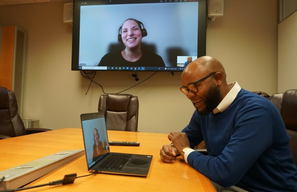 Maryam Garza, Ph.D., and Tremaine Williams, Ed.D., share a laugh during a recent meeting. 