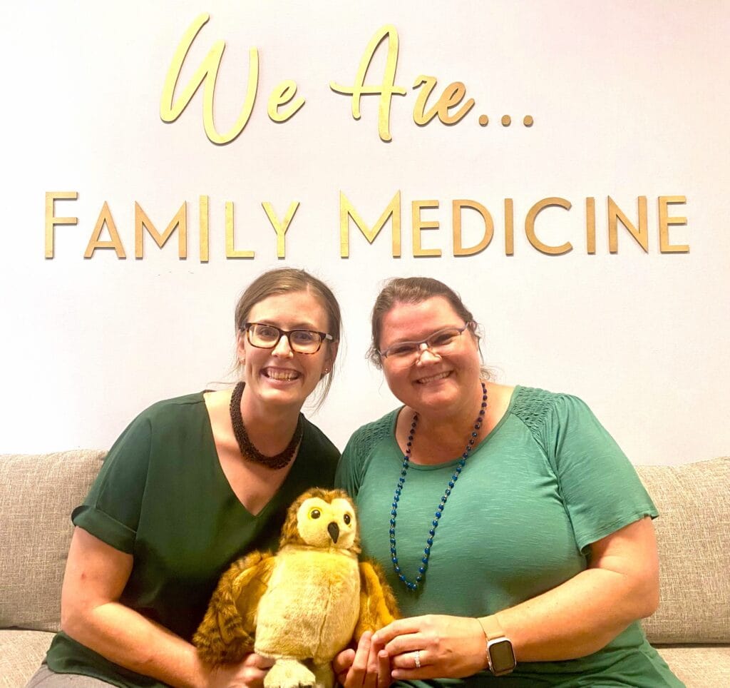 Taren Swindle, Ph.D., (left), with Lorraine McKelvey, Ph.D., and Windy WISE, the puppet owl. 