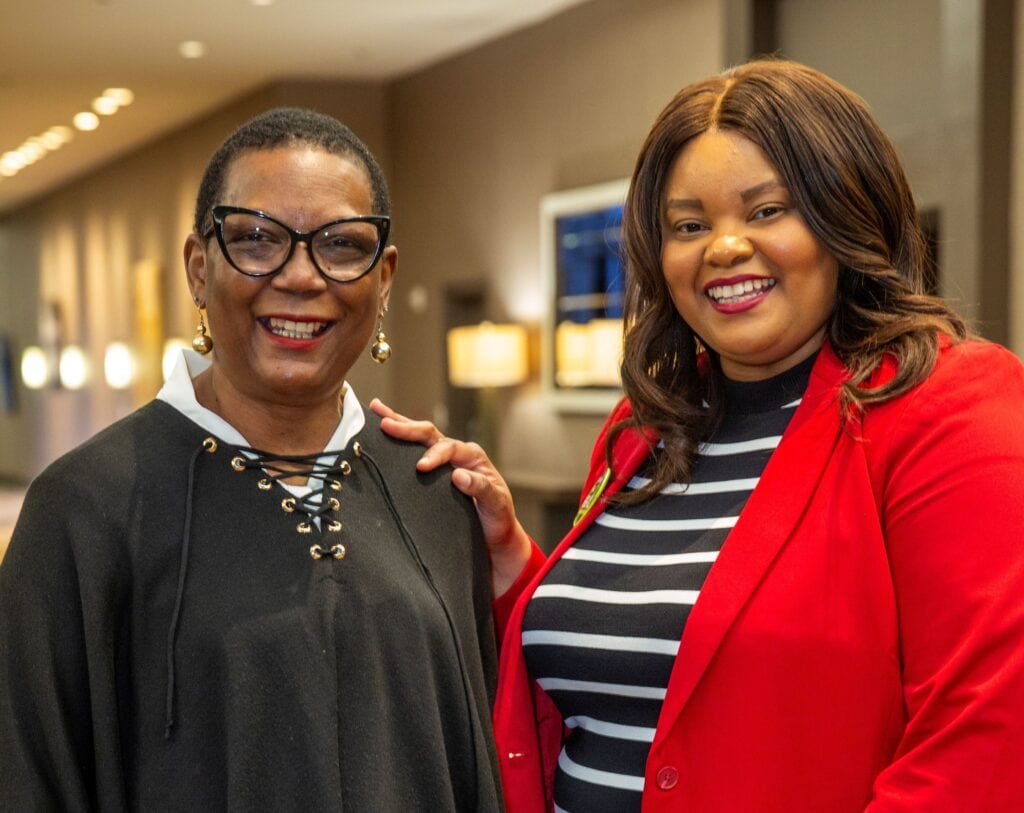 Anna Huff Davis (right), and Nakita Lovelady, Ph.D., MPH, appear in the 2024 TRI Annual Report for their work on Lovelady's hospital-based violence intervention project. 