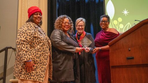 The Olly Neal Community Health Center, represented by (l-r) LaFay Broadway and Cassandra Franklin, received the Research Partner of the Year Award. Laura James, M.D., TRI director, and Tiffany Haynes, Ph.D., director of TRI’s Community Engagement Core, presented the award.