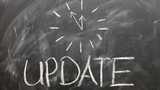 Chalkboard with word "Update" written on it.