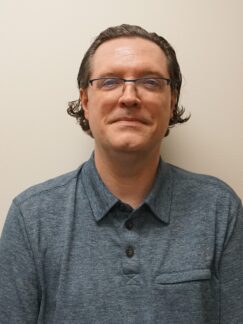 Jason Plaxco, BS, CRS Jason Plaxco is a man with dark hair and wearing glasses.