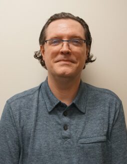 Jason Plaxco, BS, CRS Jason Plaxco is a man with dark hair and wearing glasses.