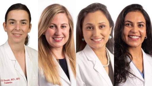 Four UAMS neonatologists (from left) Nahed O. ElHassan, Jennifer Rumpel, Megha Sharma, and Ankita Shukla recently earned Doctor of Philosophy degrees. All wear lab coats.